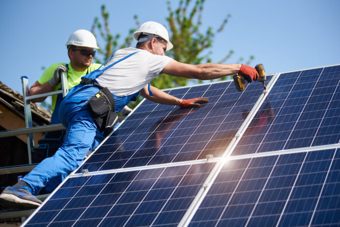 Stand-alone exterior solar panel system installation, renewable green energy generation concept. FOTOVOLTAICO CONTO TERMICO