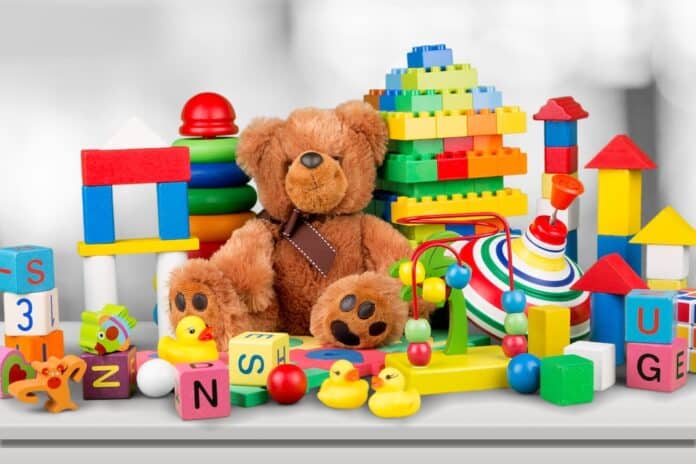 Many colorful toys collection on desk GIOCATTOLI