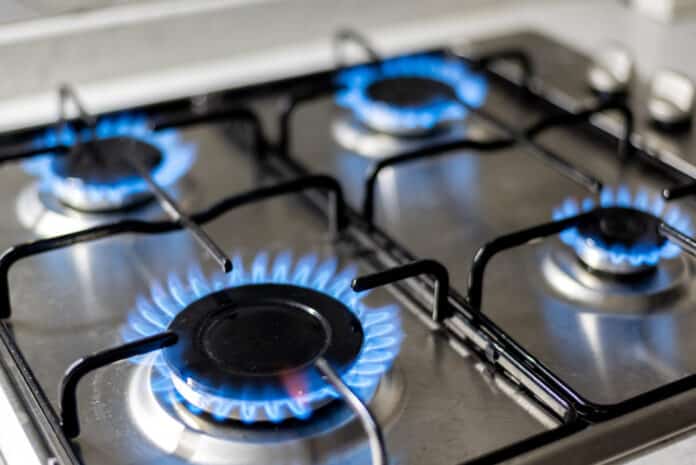 Gas cooker with burning flames of propane gas. gas