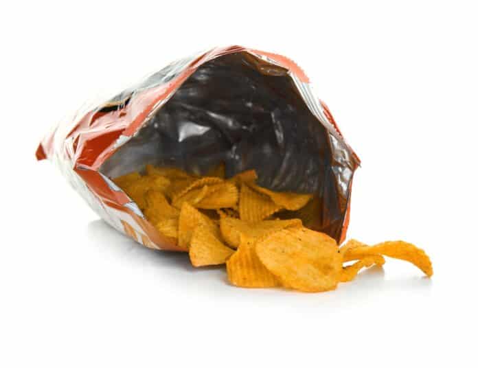Package with potato chips on white background PATATINE