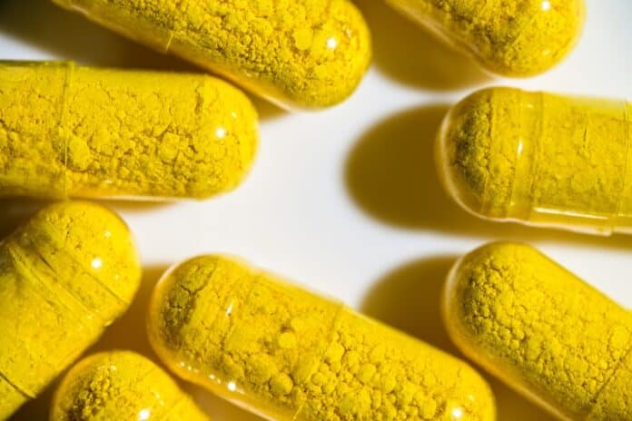 Close up of Berberine Supplement Capsule on White Background BERBERINA
