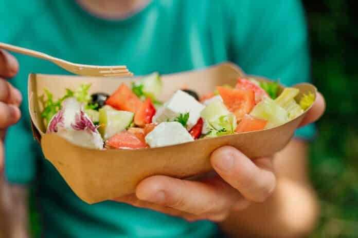 Vegetable salad in the brown kraft paper food container Mosh Moah